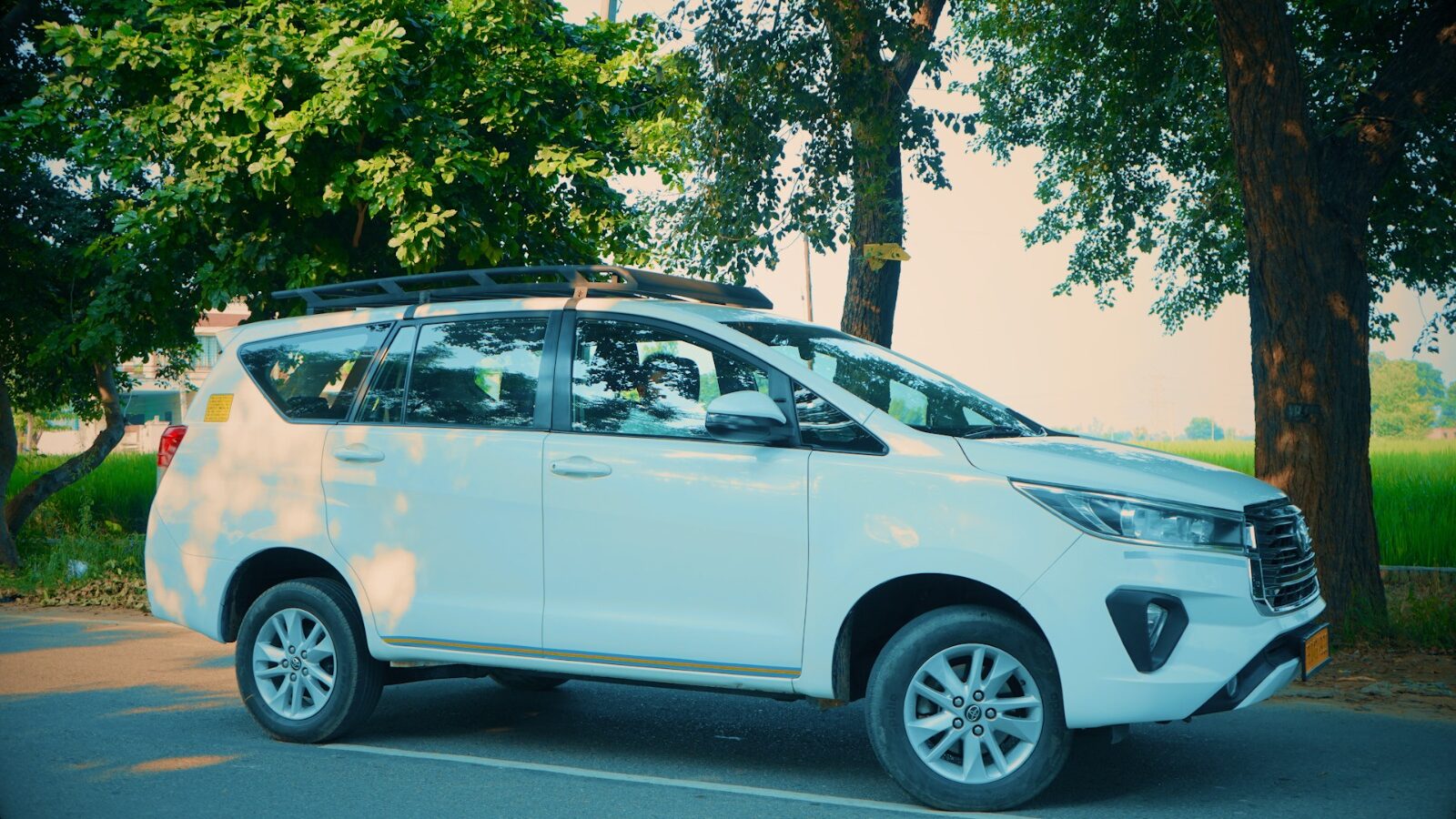 White Toyota Innova Crysta rental for outstation travel