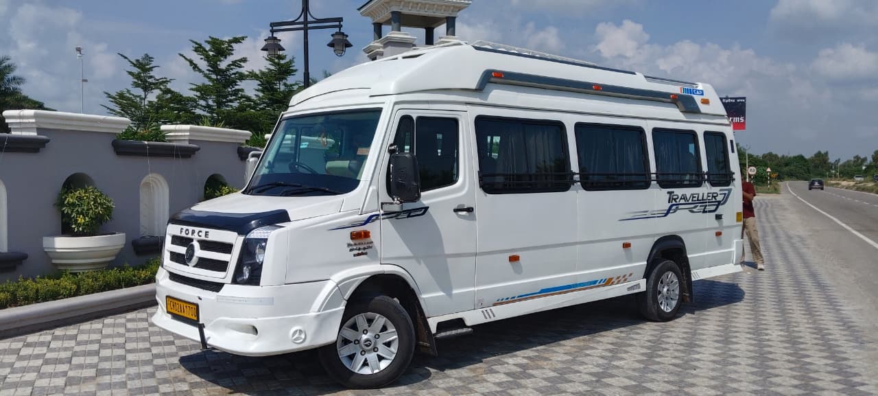 White Force Traveller van parked on a tiled driveway