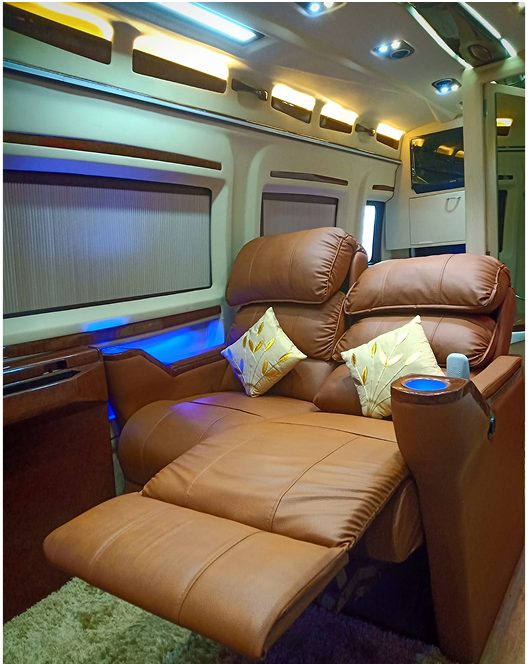 Custom van electric reclining seat with gold accent pillows