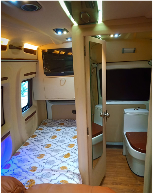 Traveller van with attached washroom